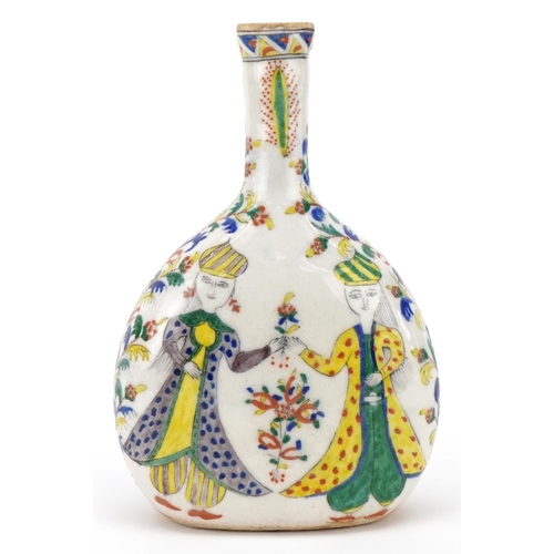 245 - Ottoman Turkish Kütahya glazed pottery bottle vase, 20th century, of flattened form, hand painted wi... 