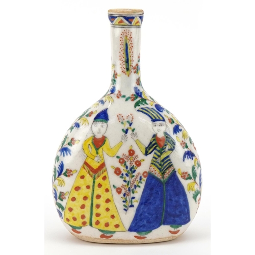 245 - Ottoman Turkish Kütahya glazed pottery bottle vase, 20th century, of flattened form, hand painted wi... 