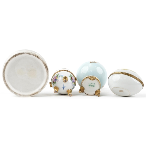 1233 - A Limoges, hand painted porcelain egg shaped box together with a similar, a Limoges lidded vase and ... 