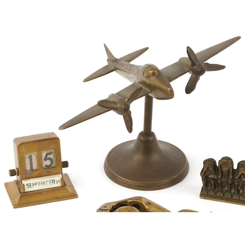 1151 - Small group of collectors items to include desk calendar, desk stand in the form of a twin propeller... 