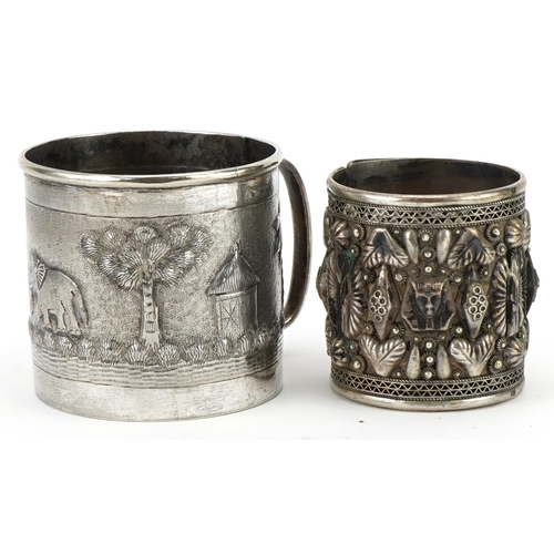 432 - An Indian .800 silver mug with engraved decoration, 6cm high, together with an Indian .800 silver fi... 