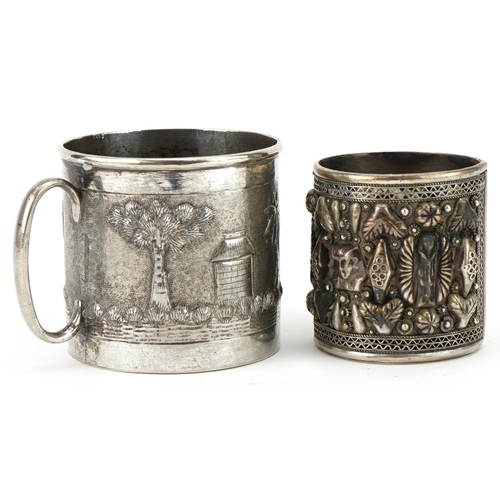 432 - An Indian .800 silver mug with engraved decoration, 6cm high, together with an Indian .800 silver fi... 