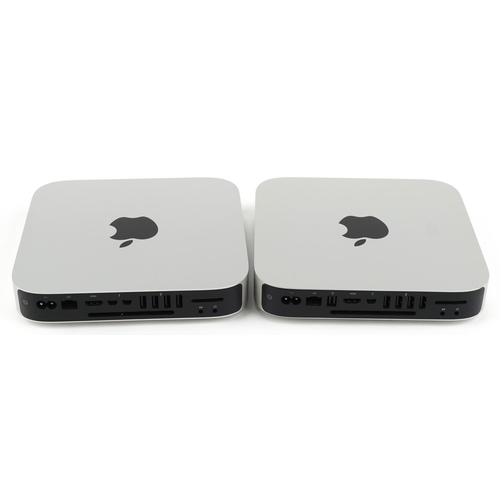 1181 - Two Mac Minis with boxes model A1347