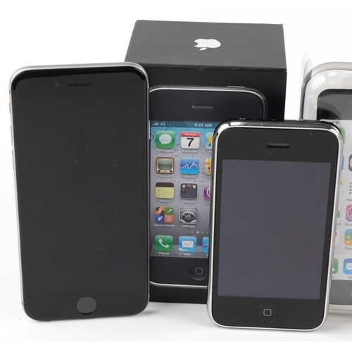 1129 - Three Apple iPhones, two with boxes, comprising 8GB iPhone 3GS model A1303, 8GB iPhone 5C model A150... 