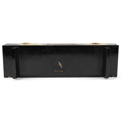 1173 - Japanese black lacquered musical jewellery box hand painted with views of Mount Fuji, 43cm in length