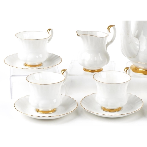 568 - Royal Albert Val d'Or six place coffee service, the coffee pot 22cm high