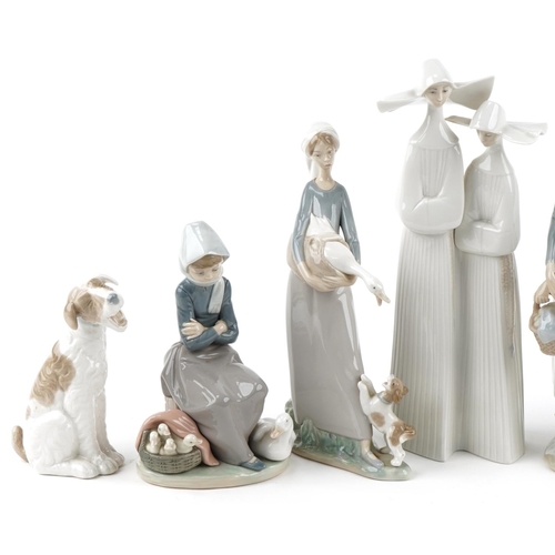 527 - Seven Lladro and Nao porcelain figures and animals including girl with geese, girl with balloons and... 