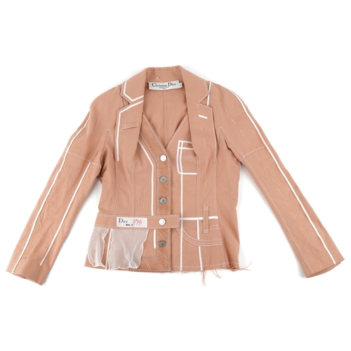 1441 - Christian Dior Boutique Paris ladies peach denim jacket with white piping, with engraved buttons and... 