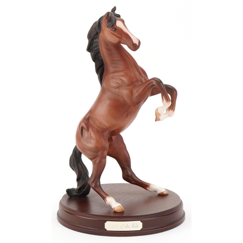 497 - Royal Doulton Spirit of the Wild figure of a rearing horse on a turned wooden base, H-31cm