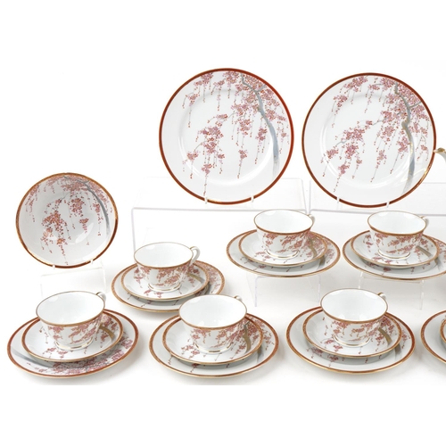 563 - Japanese porcelain tea service, 20th century, decorated with blossom bearing two character mark to t... 