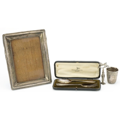 429 - Group of silver items including a silver photograph frame, silver seal, silver cased fork and spoon ... 