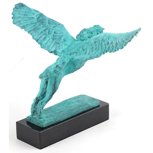 526 - Mark Coreth for McArthur Glen Group, verdigris bronze figure of a winged lion raised on a black slat... 