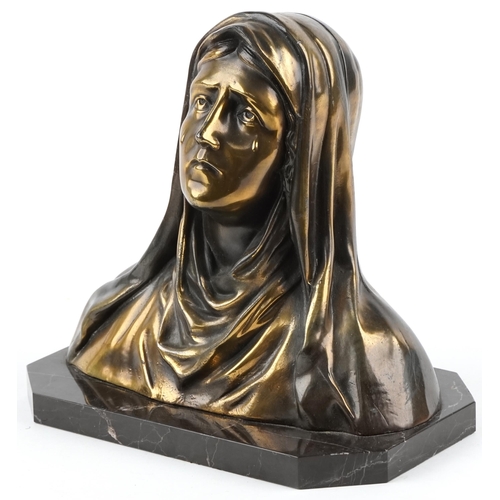 295 - Bronzed spelter bust of weeping Madonna raised on a black marble base, 22cm high