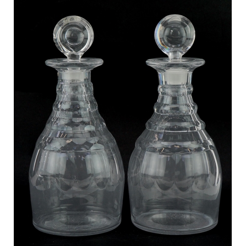 253 - Pair of Georgian cut glass decanters with stoppers, 27cm high