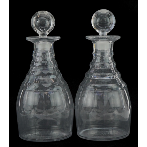 253 - Pair of Georgian cut glass decanters with stoppers, 27cm high