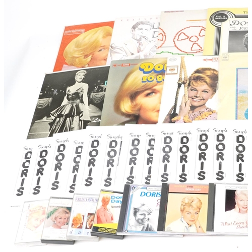 647 - Collection of Doris Day ephemera including vinyl LP record, tape cassettes, CDs and newsletters of T... 