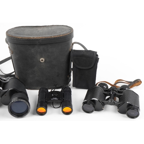 1493 - Three pairs of vintage and later binoculars and a pair of folding opera glasses including Titan 7 x ... 