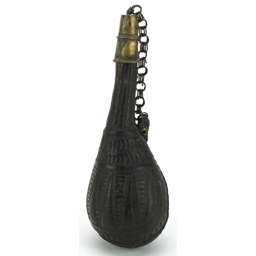 142 - Antique Middle Eastern camel scrotum powder flask with measuring cap lid, 18cm in length