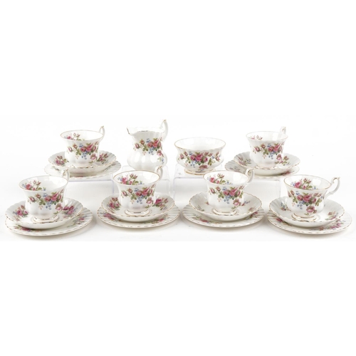 559 - Six Royal Albert Moss Rose trios with sugar bowl and milk jug, the largest 16cm in diameter