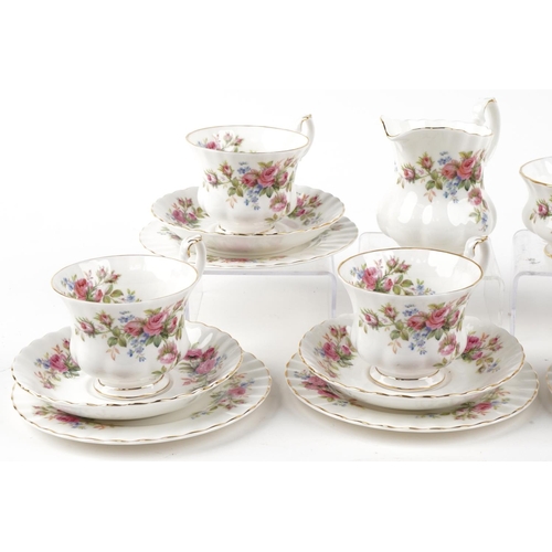 559 - Six Royal Albert Moss Rose trios with sugar bowl and milk jug, the largest 16cm in diameter