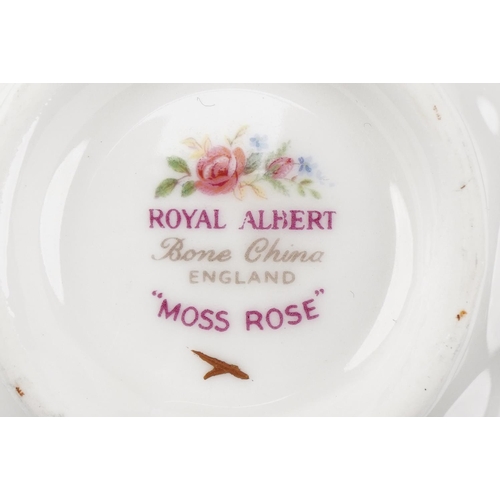 559 - Six Royal Albert Moss Rose trios with sugar bowl and milk jug, the largest 16cm in diameter