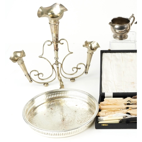 1198 - Mixed group of plated items including a four piece tea set, circular tray, cased fish knives and for... 