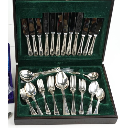 1198 - Mixed group of plated items including a four piece tea set, circular tray, cased fish knives and for... 