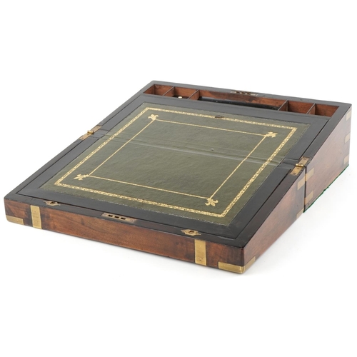 335 - Late George III walnut and brass bound writing slop, the hinged lid revealing a green gilt tooled le... 