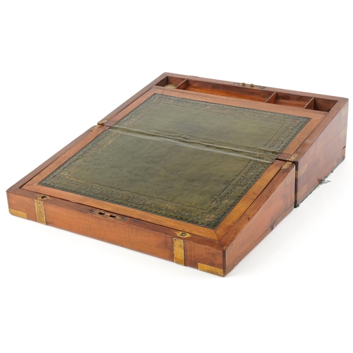 336 - Late George III mahogany and brass bound writing slope, the hinged top revealing a green gilt tooled... 