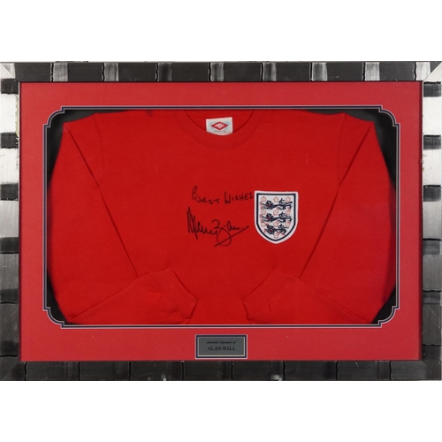 2485 - Signed replica England jumper signed by Alan Ball, framed and glazed, 87cm x 62cm