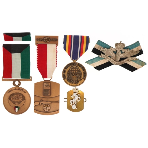 2566 - Military interest medals and cap badges including Imperial General Service Award for a Pointsman Lev... 