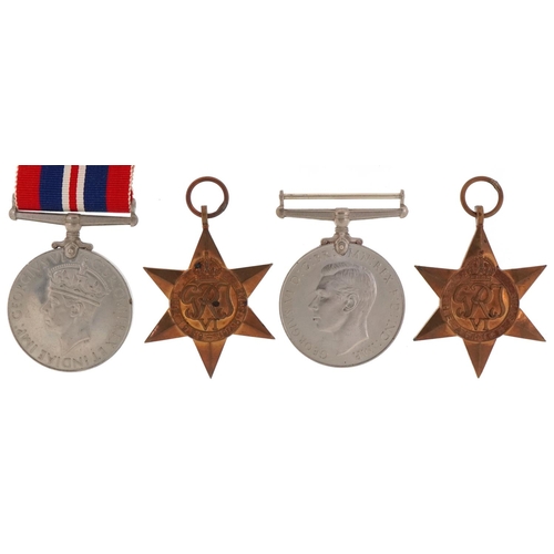 2519 - Four British military World War II medals with ribbons and a bar