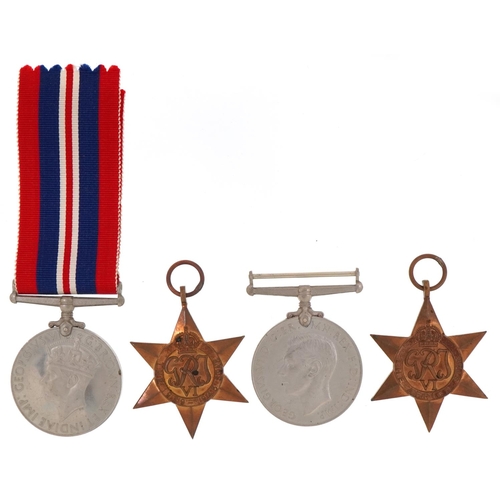 2519 - Four British military World War II medals with ribbons and a bar