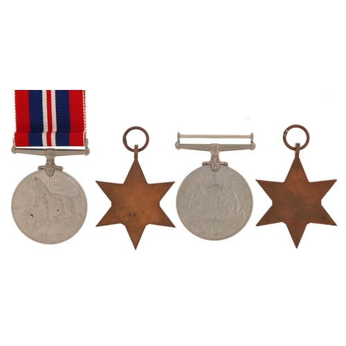 2519 - Four British military World War II medals with ribbons and a bar