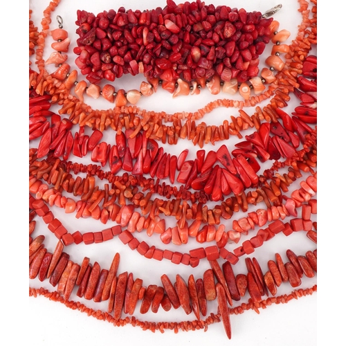 3348 - Nine red and pink coral necklaces and two bracelets, total weight 454.0g