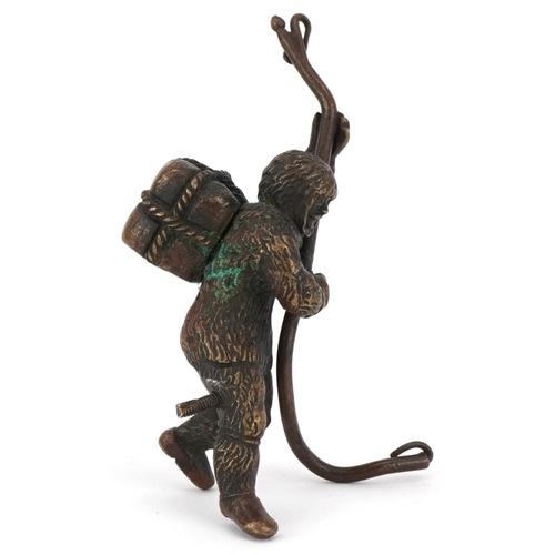 74 - Early 20th century patinated bronze figure of an Arctic explorer, 8cm high