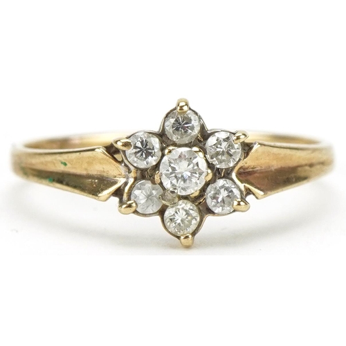 3248 - 9ct gold diamond flower head ring, the central diamond approximately 2.50mm in diameter, size L, 1.2... 