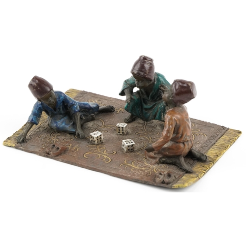 362 - After Franz Xaver Bergmann, cold painted bronze of three Arab children playing with dice, 20cm wide