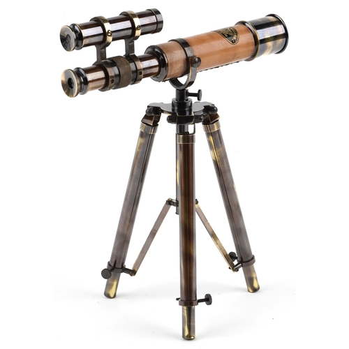 1186 - Gilt metal desktop telescope with tripod base, 30cm high