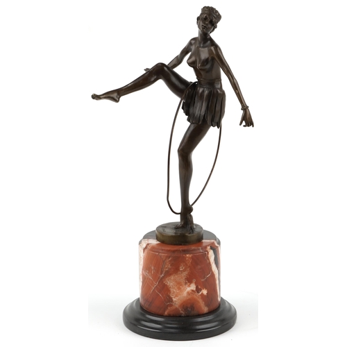 270 - Patinated bronze study of an Art Deco female dancer raised on marble column base, 48cm high