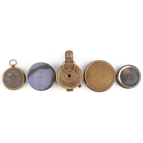 1149 - Five naval interest brass compasses, the largest 8cm in diameter