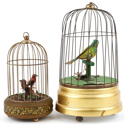 10 - 20th century tinplate musical automaton bird in a cage, probably German, 34cm high, together with a ... 