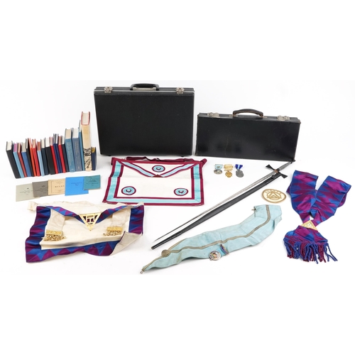 2427 - Collection of masonic memorabilia to include a Widmord Lodge silver enamelled badge and two aprons, ... 