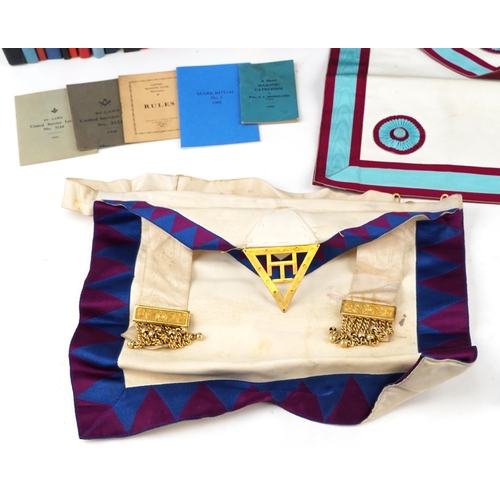 2427 - Collection of masonic memorabilia to include a Widmord Lodge silver enamelled badge and two aprons, ... 