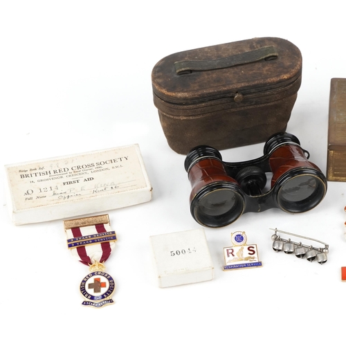 2526 - Three British Red Cross Society enamel medals, World War I medal presented to J Bush, a pair of leat... 