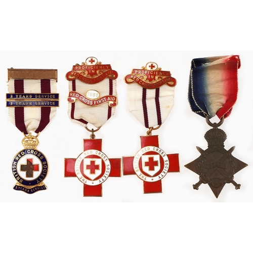 2526 - Three British Red Cross Society enamel medals, World War I medal presented to J Bush, a pair of leat... 