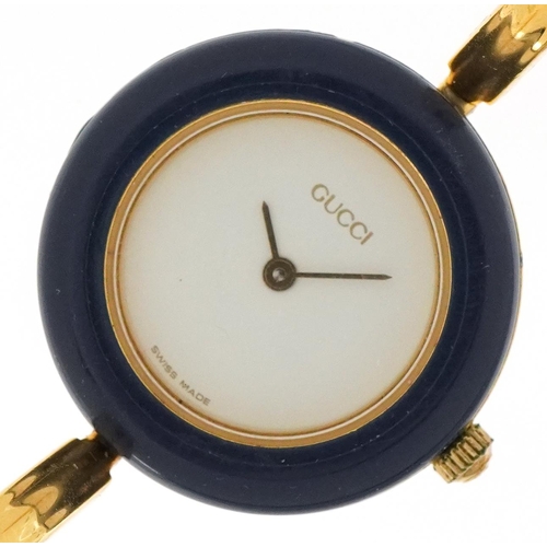 3107 - Gucci gold plated ladies bracelet wristwatch with interchangeable coloured bezels, the case 2.8cm in... 