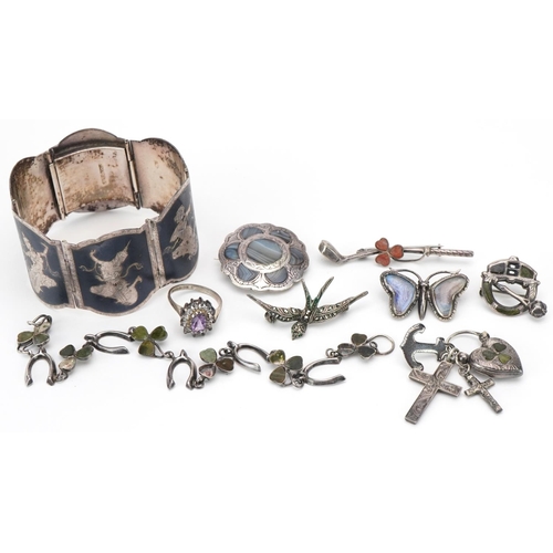 3344 - Small group of silver jewellery including an Indian bangle, five brooches, charm bracelet and a past... 