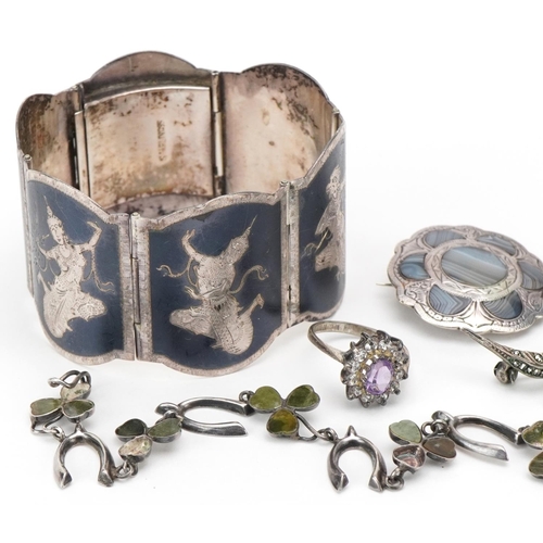 3344 - Small group of silver jewellery including an Indian bangle, five brooches, charm bracelet and a past... 