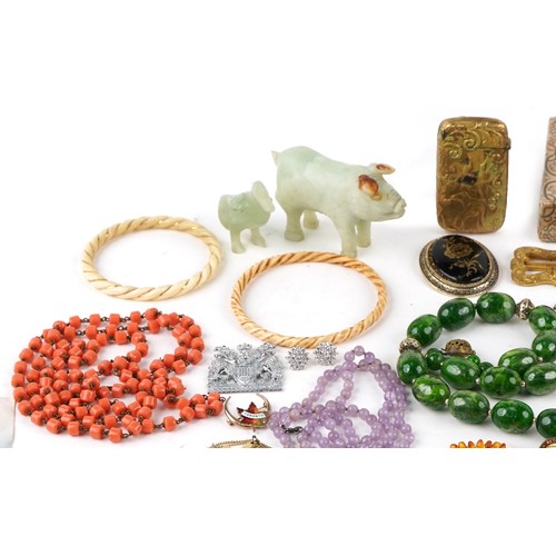 3355 - Antique and later jewellery and objects including polished stones, brass vesta embossed with a jocke... 